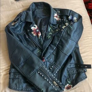 Leather jacket with embroidered flowers